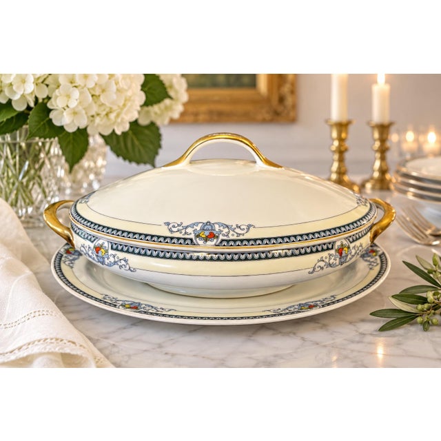 Elegant circa 1930s Japanese Meito China covered serving casserole presented with its coordinating oval underplate. This...