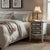 Anchor your sanctuary with the enchanting charm of this one-of-a-kind Transitional Distressed white Nightstand. This 30""...