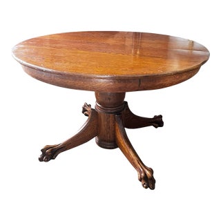 Early 1900s American Round Oak Claw Foot Table For Sale