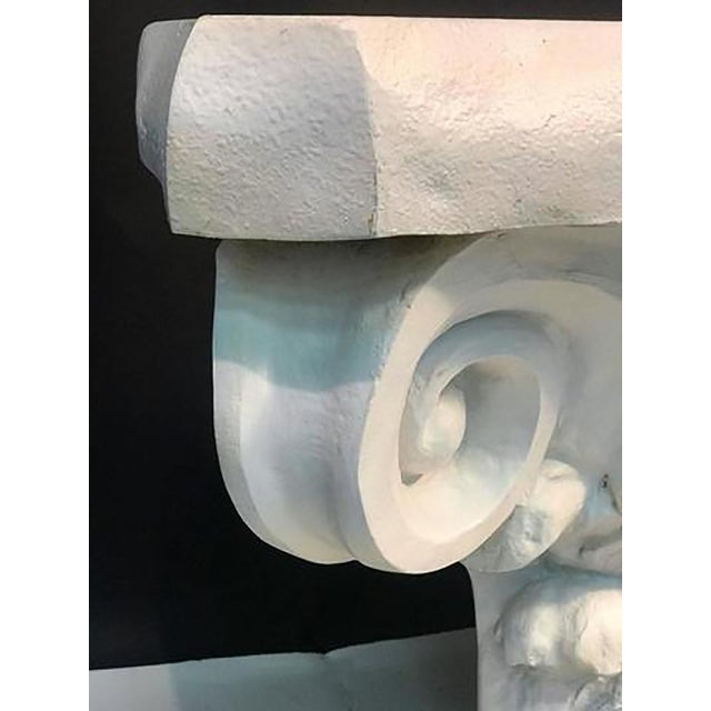 Highly decorative cast plaster composition console table in the form of acanthus leaves and flowers with curled scrolls...