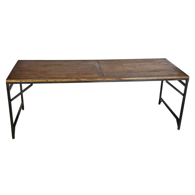 Farmhouse industrial counter table. Salvaged teak wood top with lots of character and antiqued iron legs which fold down...