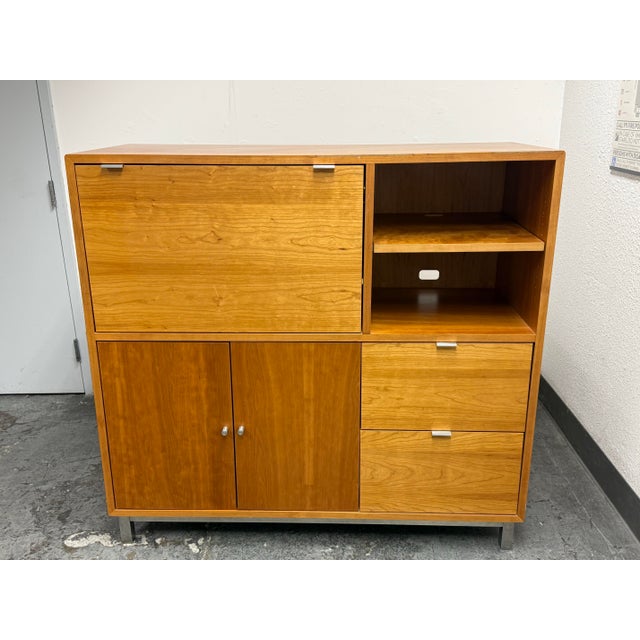 Design Plus Gallery presents the Copenhagen Collection Office Armoire from Room & Board. Cherry veneer displays flowing...