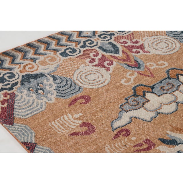 Hand-knotted in wool, this grand 10x14 contemporary rug joins Rug & Kilim’s Modern collection, capturing twin celestial...