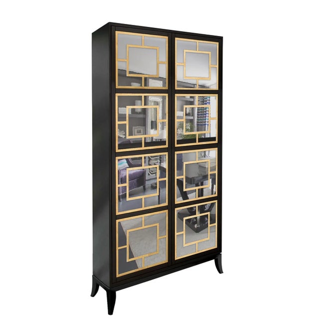 This two-door cabinet is beautifully handcrafted in Italy. Perfect for storing everything from books to dinnerware, it...