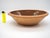A beautiful hand-thrown batter bowl in a rustic, Nordic ceramic tradition. The bowl has a warm, glossy brown interior and...