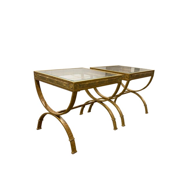 Pair of Neoclassical style metal indoor-outdoor side tables with faux bois finish and verdigris detailing. Dimensions: H:...