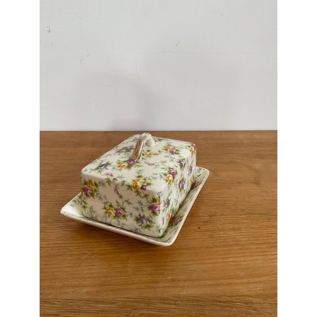 Add a touch of pre-war elegance to your table with this authentic English-style Chintz butter dish, hand-painted in Japan...