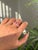 This half band ring is features a 1.5 carat natural oval rubies in 14K yellow gold. and vibrant with a total stone weight...