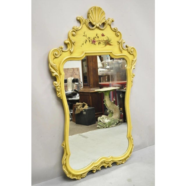 Vintage Union National Chinoiserie Yellow Shell Carved Wood Frame Wall Mirror. Item features hand painted floral detail,...