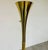 A pair of elegant and beautiful sculptural fluted brass floor lamps by Laurel Lamp Company circa 1960 having twist ball...