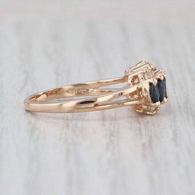 Gemstone Information: - Natural Sapphires - Total Carats - 0.64ctw Cut - Marquise Brilliant Color - Dark Blue Treatment -...