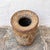 A vintage handcrafted wooden decorative pot featuring intricate hand-cut bone inlay in traditional floral and geometric...
