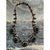 This vintage necklace is a dramatic, jewel-toned collar in the manner of Mughal-inspired costume jewelry, set in warm...