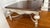 2000 - 2009 Distressed Habersham Square Coffee Table With Carved Ribbon & Laurel Detail For Sale - Image 5 of 14