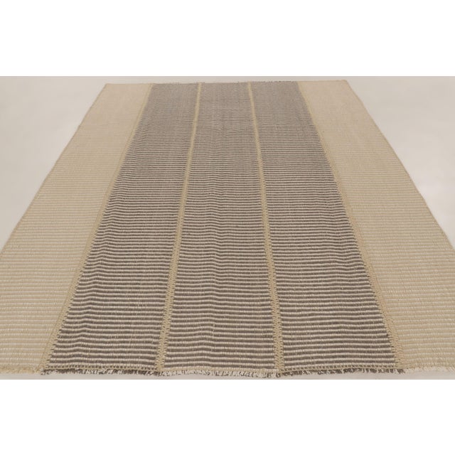 Handwoven in wool, this 8x10 contemporary kilim is a sophisticated addition to Rug & Kilim’s curation. This brand-new...