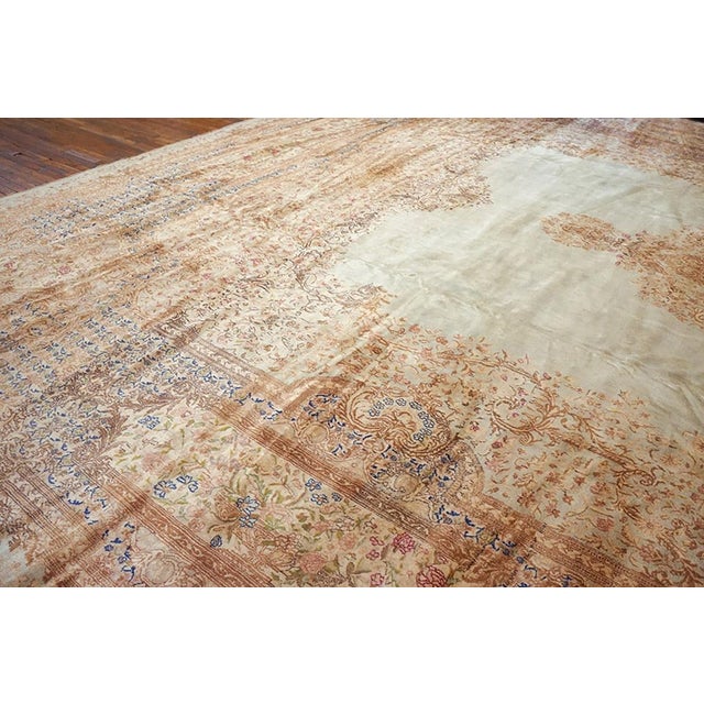 Traditional Mesmerizing Antique Persian Kerman Rug on a Ivory Background Color With Special Medallion Design For Sale - Image 3 of 5