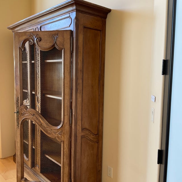 Below is a description and photos of the French style armoire. The armoire is classic and would be a beautiful accent to a...