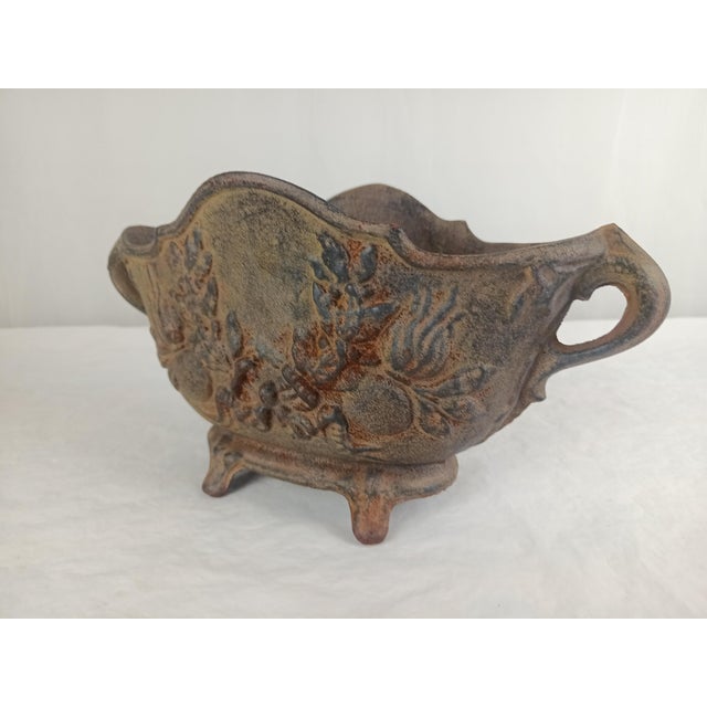 Antique cast iron jardinière (planter), French in origin and dating back to the late 19th or early 20th century. Popular...