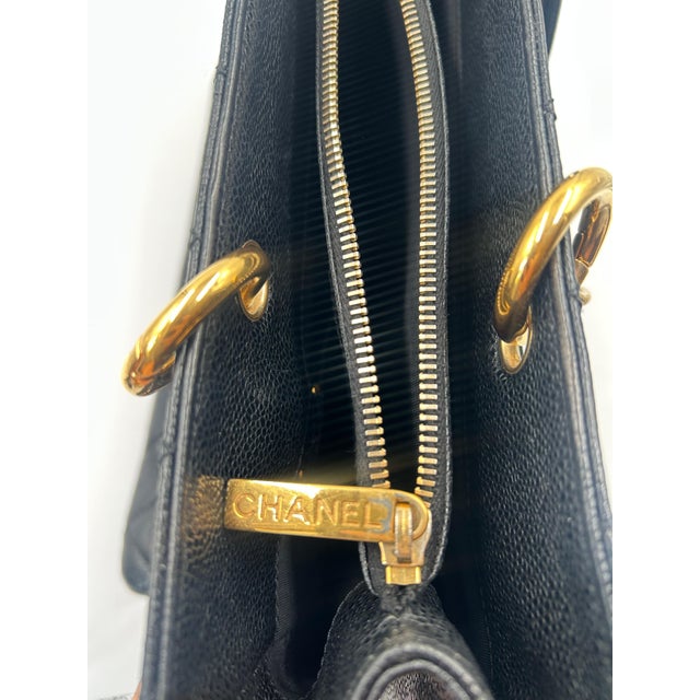 The Chanel Black Quilted Leather Tote Bag is a refined and versatile piece that blends timeless Chanel elegance with...