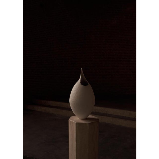Ewer by laura pasquino limited edition of 8 dimensions: d 24 x h 46 cm material: soft-paste porcelain, glaze. Laura...