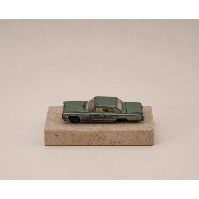 Original vintage die cast model of the oldsmobile 98 from siku, mounted on a solid marble base. A unique, one of a kind...