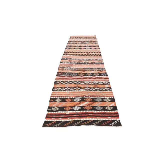 Vintage handwoven decorative kilim rug from Malatya region of Turkey. Approximately 50-60 years old. In very good condition.