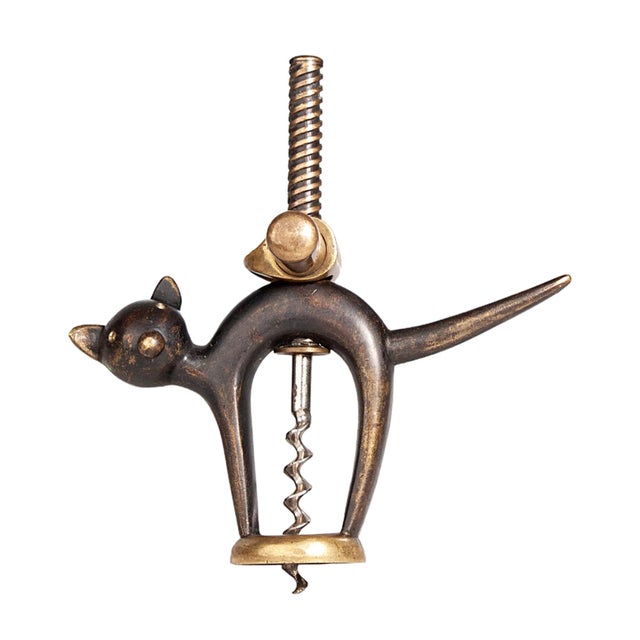 Early 20th century Art Déco black and golden brass cat corkscrew, Germany By: unknown Material: brass, metal, copper,...