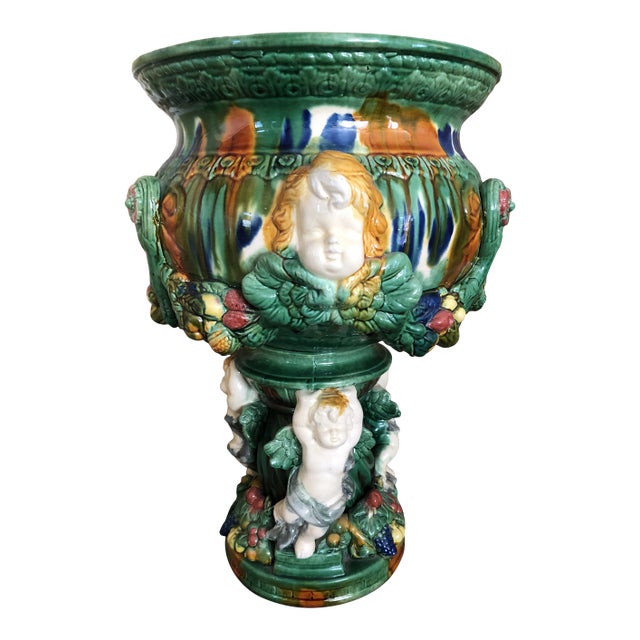 Vintage Neoclassical Glazed Ceramic Pedestal Jardiniere with Cherub Motif For Sale