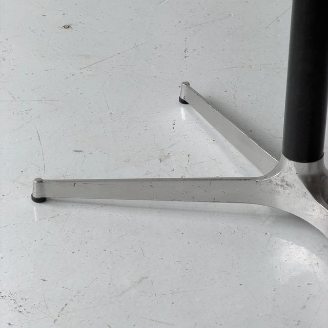 c. 1990s. USA. Stainless steel top with metal base.
