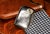 Step into the lavish allure of Edwardian sophistication with this distinguished English sterling silver cigarette case, a...