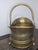 Add a touch of Regency elegance to your home with this substantial vintage brass scuttle. Featuring an oval, hand-hammered...