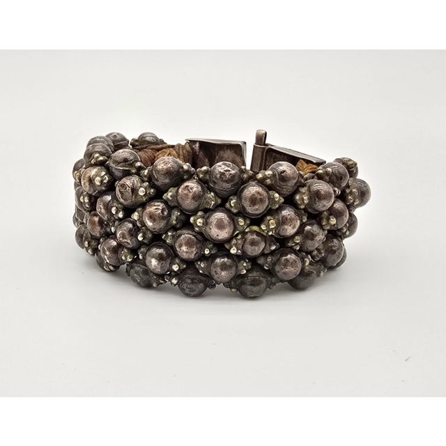 Description: From Rajasthan, India Silver beads sewn onto fabric Post holds clasp together Weighs 4 oz. Condition:...