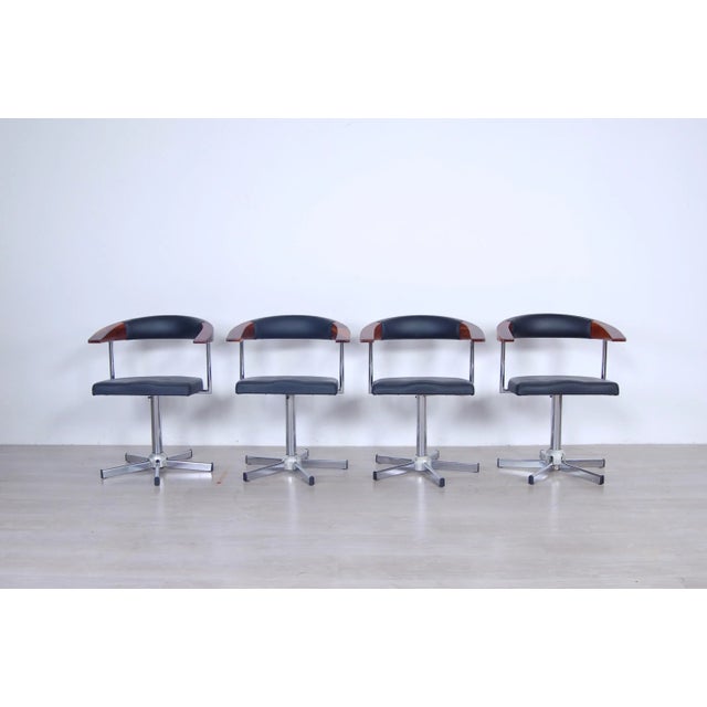 Set consists of 4 chairs armchairs from hair salon, original production around the '90s. Reusable today for office...