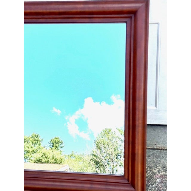 Beautiful solid cherry hand made mirror by Eldred Wheeler of Hingham, Ma. Piece bear the Wheeler label and the name is...