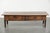 This characterful rectangular antique walnut Southern European coffee table with two drawers dates from the 18th century...