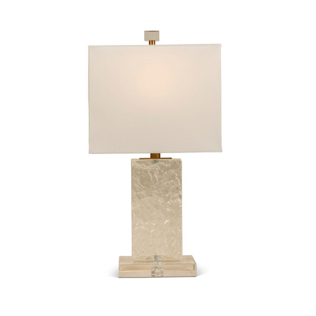 Name: Azure Clear Accent Lamp Size: 19"H x 10"W x 7"D Organic, yet timelessly modern -- Azure is our solid textured glass...