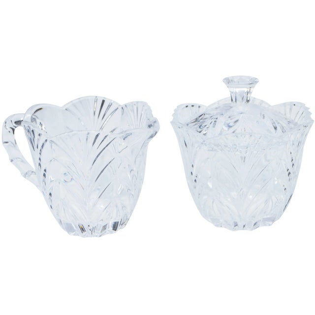 Vintage textured sugar and creamer with ornate crystal-cut design and intricate details. No maker's mark. Sugar; 5"L x...