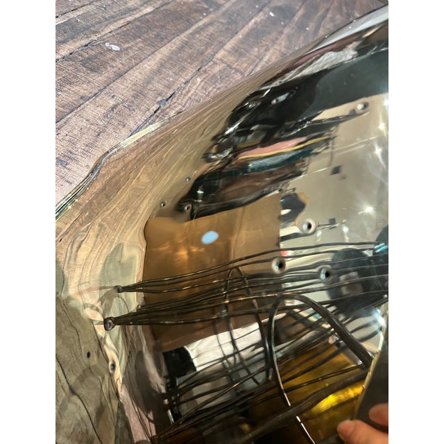 Brass pendant light Uses one 100-watt bulb Overall 26" diameter x 22" height Includes hanging hardware Weight, 21.0 lbs...