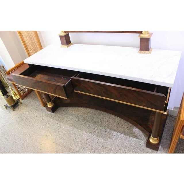 This stylish and chic Napoleon III style console with mirror was acquired from a Palm Beach estate and it will make a...