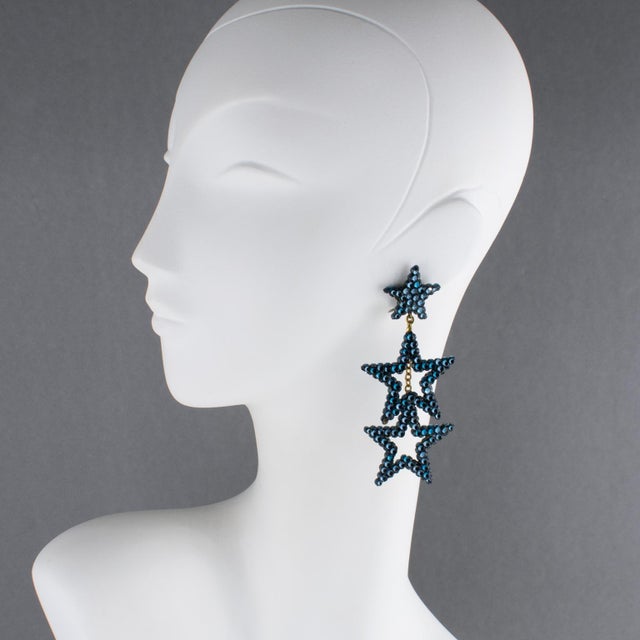 Richard Kerr designed these gorgeous chandelier clip-on earrings in the 1980s. They are made of his signature pave...