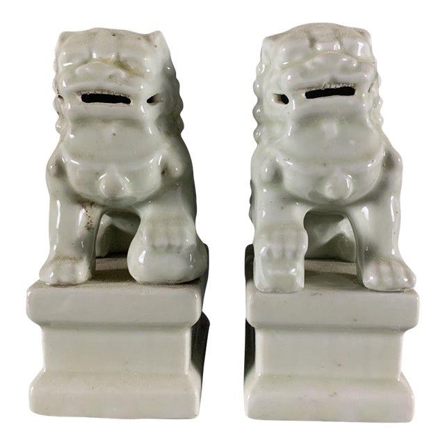 Vintage Pair of Chinese Celadon Glaze Ceramic Foo Dogs / Guardian Lions on Pedestals For Sale