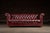 English Vintage Tufted Leather Chesterfield Sofa in Oxblood For Sale - Image 3 of 11