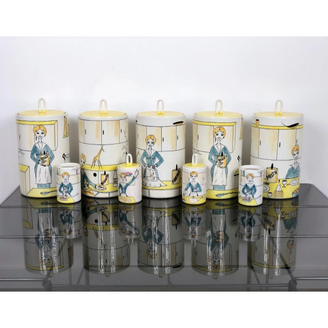 Set of nine spice jars: five big jars (25 h x 13cm diameter) and four little (12 H x 16 D cm). On the big ones there are...