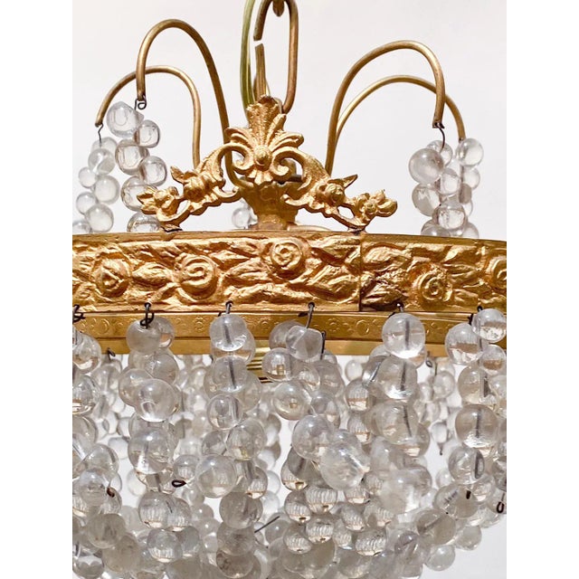 Vintage basket chandelier with brass rim frame and vintage bead chains. It has 1 edison base socket that can hold up to...