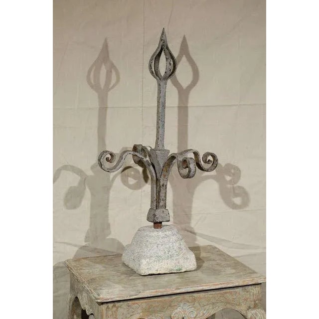 A French 19th century large size painted iron finial in granite base. The finial itself comes off its base. Wonderful look.
