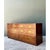 Crafted by the renowned maker Henredon, this exceptional vintage campaign dresser exemplifies mid-twentieth-century design...