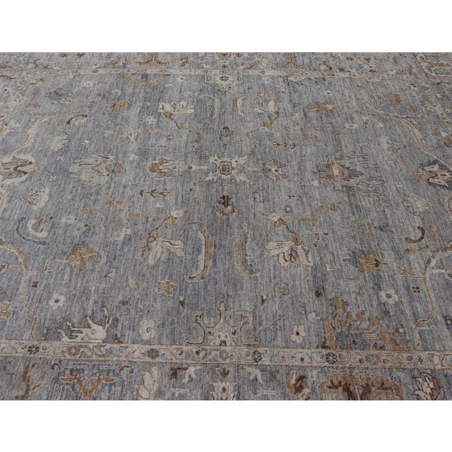 Measures: 12'2 x 14'10 Large Turkish Angora Oushak Rug by Keivan Woven Arts in Light Blue 12'2 x 14'8. Keivan Woven Arts....