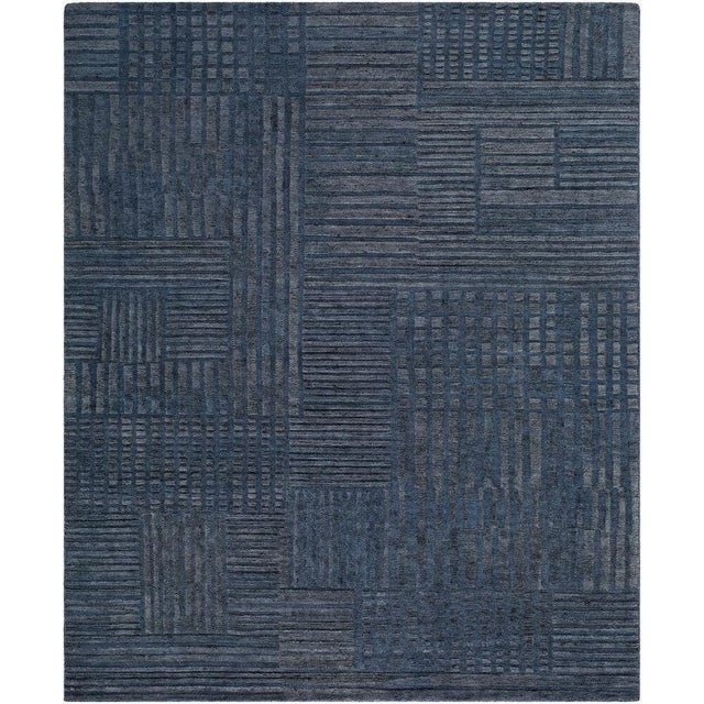 Introducing the Bergamo Collection's exquisite handmade rug, where minimalist modern design meets the luxurious texture of...