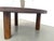 Round coffee table in solid oak with octagonal legs, made in France in the 1950s. The 4.5 cm thick circular top features a...