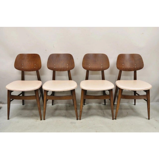 Vintage Thonet Mid Century Modern Bentwood Walnut Dining Chairs - Set of 4. Circa Mid 20th Century. Measurements: 31.5" H...